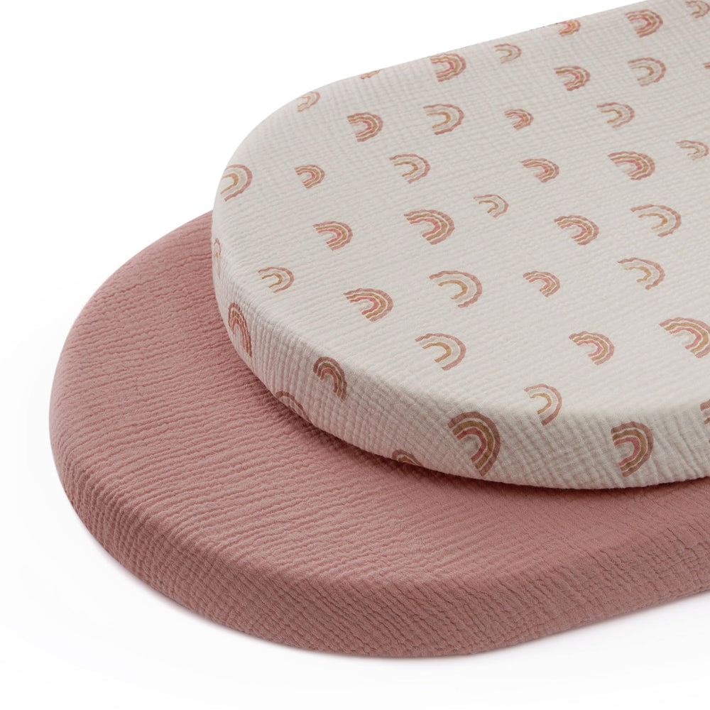 Blissful Diary muslin bassinet sheet in dusty pink shows breathable, baby-friendly comfort.