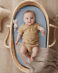 Blissful Diary muslin bassinet sheets with elastic band for snug, secure fit.