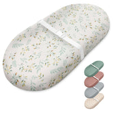 Blissful Diary muslin changing pad botanical leaf cover delivers soft touch and breathable comfort for gentle diaper changes.