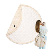 Blooom confetti 47in play mat flat lay shows plush quilting for cozy tummy time.