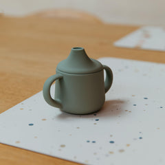 Blooom placemat wipe-clean damp-cloth care note for easy post-meal cleanup