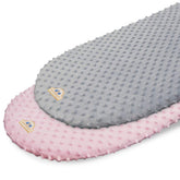 BlueSnail bassinet sheet folded in pink and gray showing soft breathable minky fabric