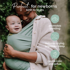 Boba sage green infant carry shows ergonomic position and snug fit.