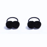 BOENBE LOVED pom ball hair tie black close-up shows soft fluffy texture for gentle hold