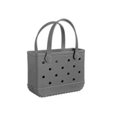 BOGG BAG Bitty small tote on the beach scene; lightweight, washable storage for snacks and toys.
