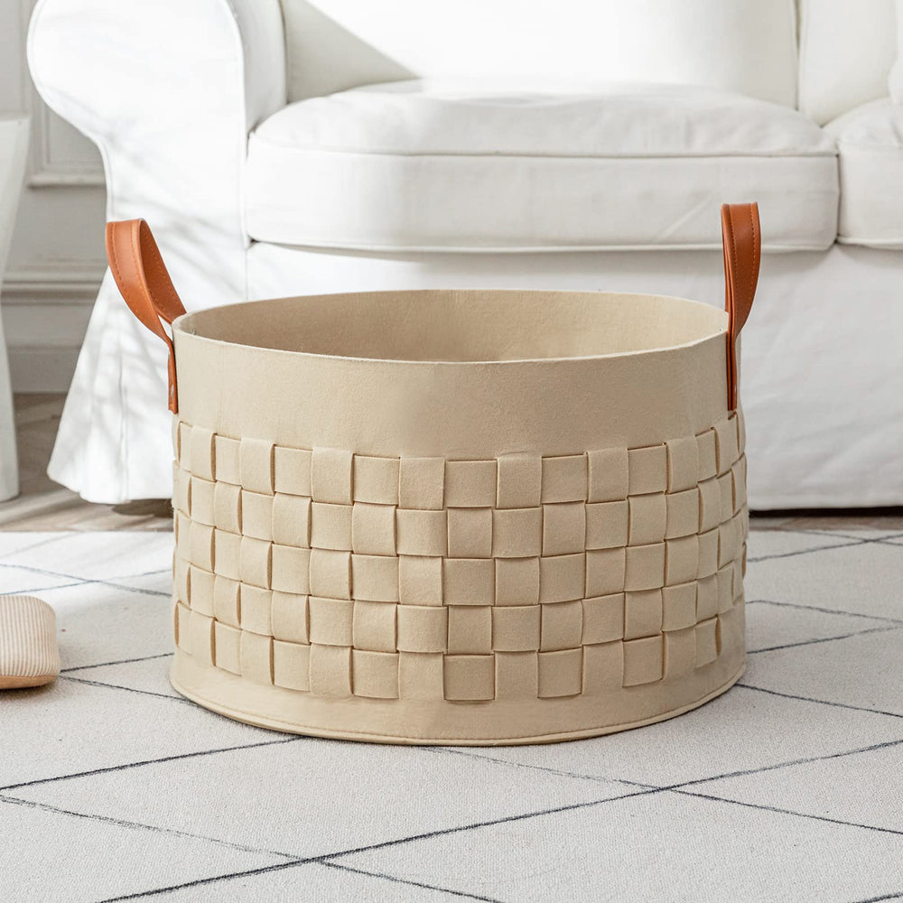 Boldmonkey XXLarge round blanket basket with handle ready for toy organization in a nursery
