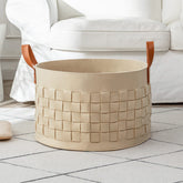 Boldmonkey XXLarge round blanket basket with handle ready for toy organization in a nursery