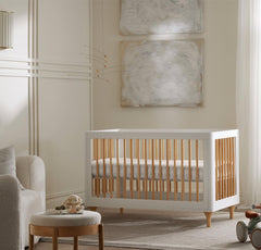 Boll & Branch secure-fit sheet with top-stitched elastic for secure crib sleep.