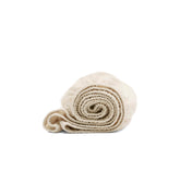 Boll & Branch Signature crib sheet weave closeup showing soft organic cotton for baby comfort.