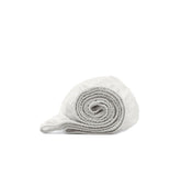 Boll & Branch Signature crib sheet white close-up shows softness for baby sleep.