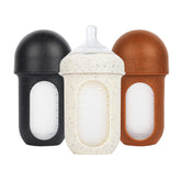 Boon Nursh speckle bottle front for comfortable feeding and style.