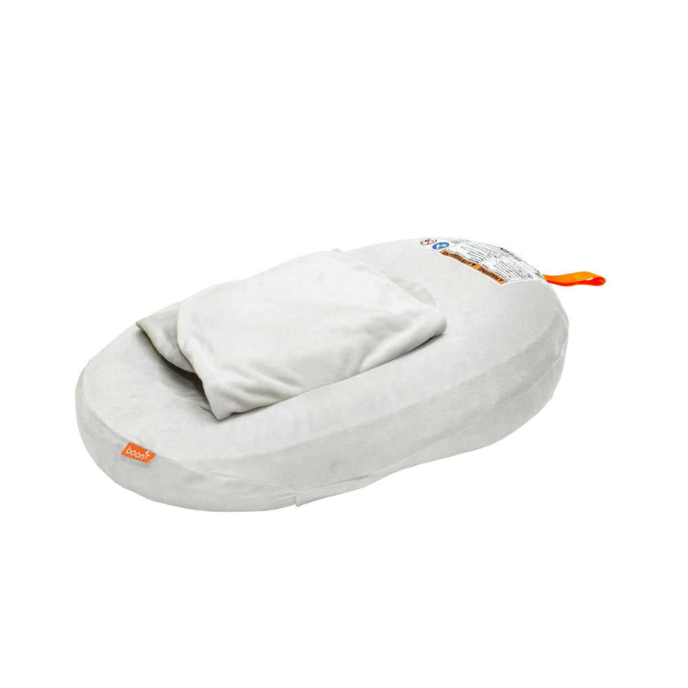 Boon Puff+ inflatable baby bather with cloud-like comfort supports gentle bath time.