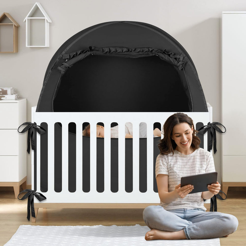 BORNA Pack N Play blackout cover over crib setup promotes calm daytime sleep.