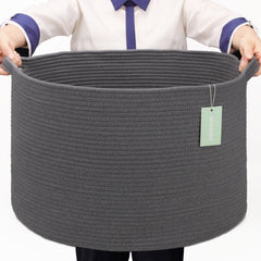 BOSROTY extra-large basket in living room stores blankets and toys.