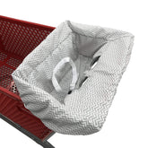Brain Architect Child gray chevron cart cover in use on a grocery cart for a comfy ride.