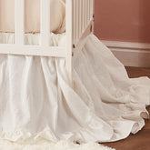 Brandream boho crib skirt beige close-up highlighting soft washed cotton texture for nursery elegance.