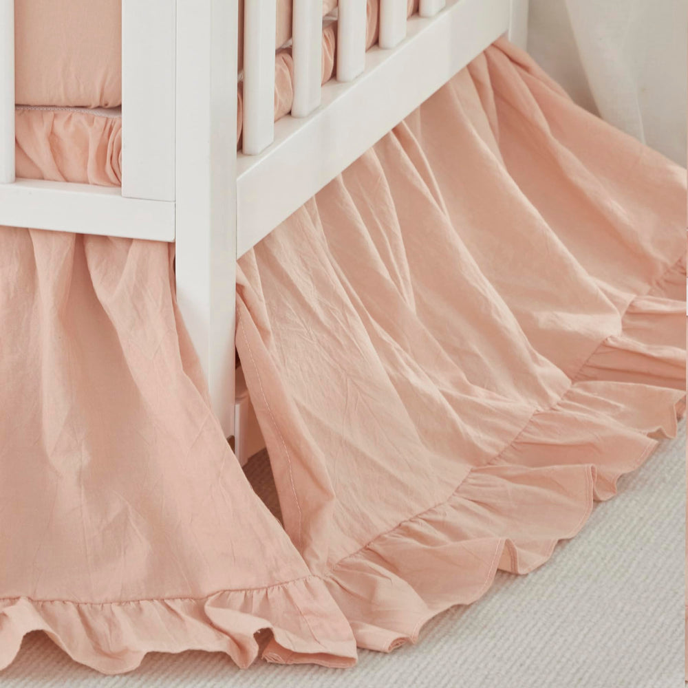 Brandream crib skirt blush close-up shows soft washed cotton texture for durable baby bedding.