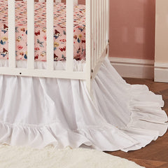 Brandream crib skirt flatlay shows 4-sided drop for standard crib fit.