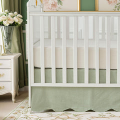 Brandream scallop-edge crib skirt closeup shows soft cotton for a cozy nursery.