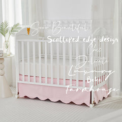 Brandream scallop edge crib skirt pink tone complements gender-neutral nursery palette.
