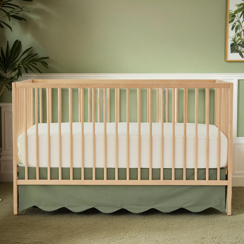 Brandream scallop edge crib skirt closeup showing soft cotton texture and finish