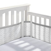 BreathableBaby full-size crib liner in gray chevron shows four-sides coverage and airflow