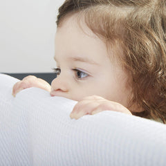 BreathableBaby easy-install with hook-and-loop closures and adjustable straps for secure fit.