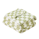 Brnabiou blanket folded in sage green checker for cozy warmth