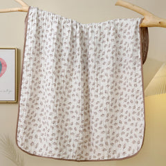 Brnabiou blanket Coffee swaddling scene shows cozy, skin-friendly fabric for newborn comfort.