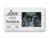 Brothers Bench Love at First Heartbeat frame on fridge magnet closeup keepsake display.
