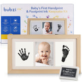 Bubzi Co baby handprint kit in natural wood package shows a keepsake setup for memories.