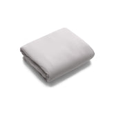 Bugaboo Stardust cotton sheet with a soft-touch surface for gentle baby skin.