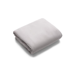 Bugaboo Stardust fitted cover showing a snug fit on the mattress.
