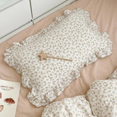 BuLuTu cotton muslin kids pillowcase with camellia flowers for gentle, breathable sleep.