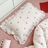 BuLuTu cotton muslin pillowcase close-up with cherry pattern showing soft fabric and edge detail