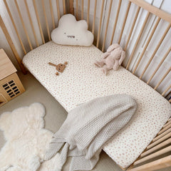 BuLuTu standard 52x28 crib sheet fits snugly on standard mattresses.