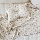 BuLuTu muslin blanket in crib view highlights generous 47x51 size for naps