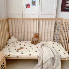 BuLuTu duck-print muslin crib sheet offers gentle touch and playful nursery style.