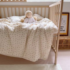 BuLuTu toddler quilt floral pattern close-up shows ultra-soft two-layer muslin for bedtime comfort.