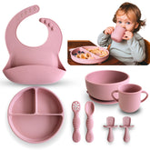 Bumble Bowl suction plate in use for mess-free self-feeding on a high chair.
