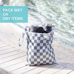 Bumkins wet bag used after pool for damp swimsuit and towel.