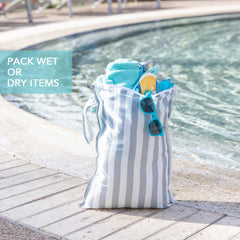Bumkins wet bag snap handle attached to stroller for easy access