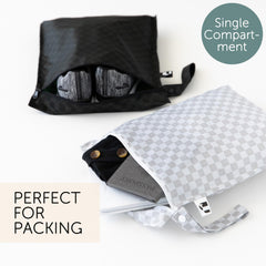 Bumkins Roamio wet bag waterproof fabric keeps messes contained during beach days.