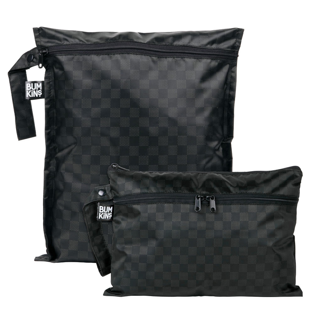 Bumkins waterproof wet bag open shows two compartments for diaper and toy organization.