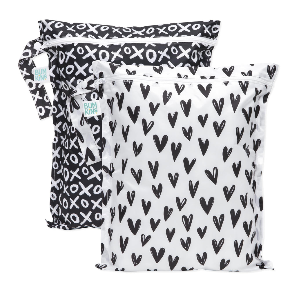 Bumkins wet bag hearts pattern—colorful storage for swimwear and towels on trips.