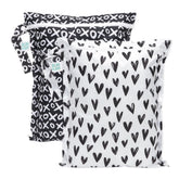 Bumkins wet bag hearts pattern—colorful storage for swimwear and towels on trips.