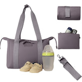 BUNSO Baby diaper bag tote front view with minimalist design and organized compartments.
