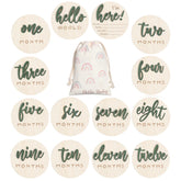 Burbell green wood 3D baby milestone discs for keepsake monthly photo memories.