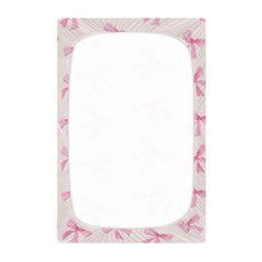 Burbuja Pink Bow crib sheet with elastic band secure fit around mattress