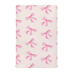 Burbuja Pink Bow crib sheet close-up shows soft modal fabric for gentle touch